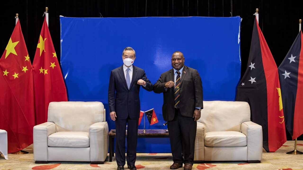 PNG Prime Minister James Marape (R) meets Chinese Foreign Minister Wang Yi in Port Moresby