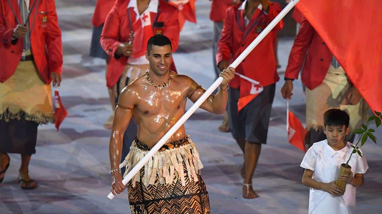 Tonga's flagbearer Pita Nikolas Taufatofua leads his delegation during the opening ceremony of the Rio 2016 Olympic Games.