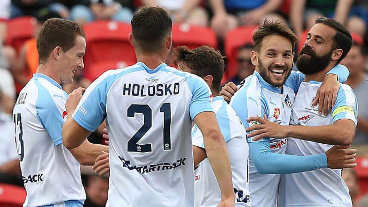 Sydney players celebrate Alex Brosque's goal