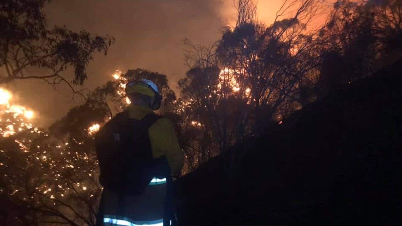 A bushfire continues to burn uncontrolled in the Adelaide Hills