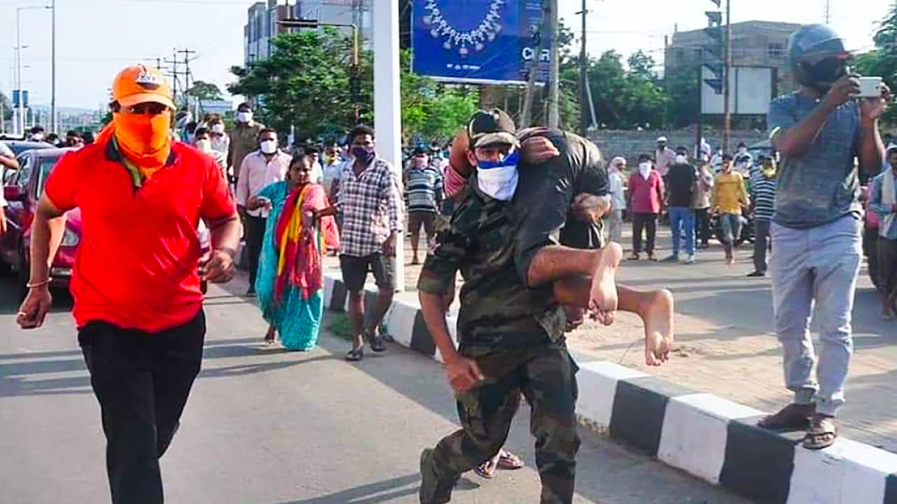 Rescuers evacuate people following the gas leak incident.