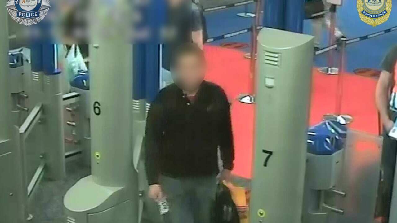 Op Hayman - 2012 photo showing the man arriving at Sydney Airport after allegedly secreting illicit drugs in a plan fueslage (1).jpg