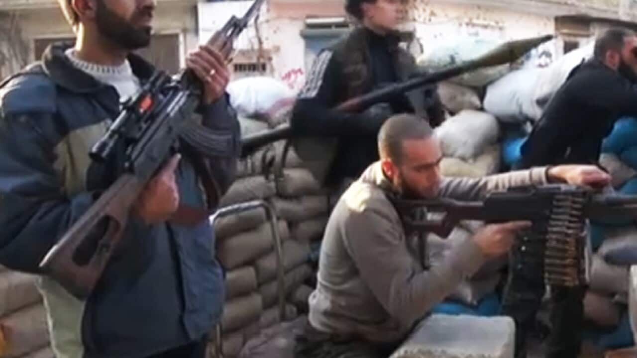 syria_homs_rebels_fighter_cnn_444500021