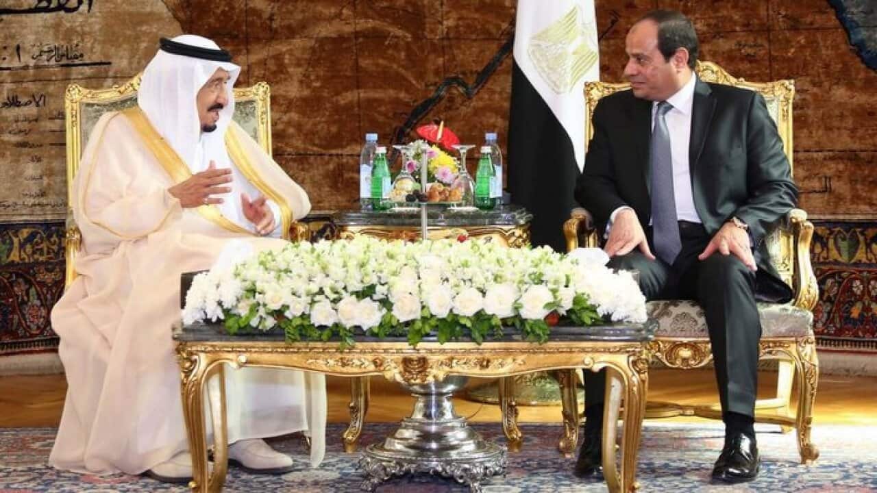 Egyptian President Abdel Fattah al-Sisi and King Salman of Saudi Arabia talk in the Egyptian Presidential Palace