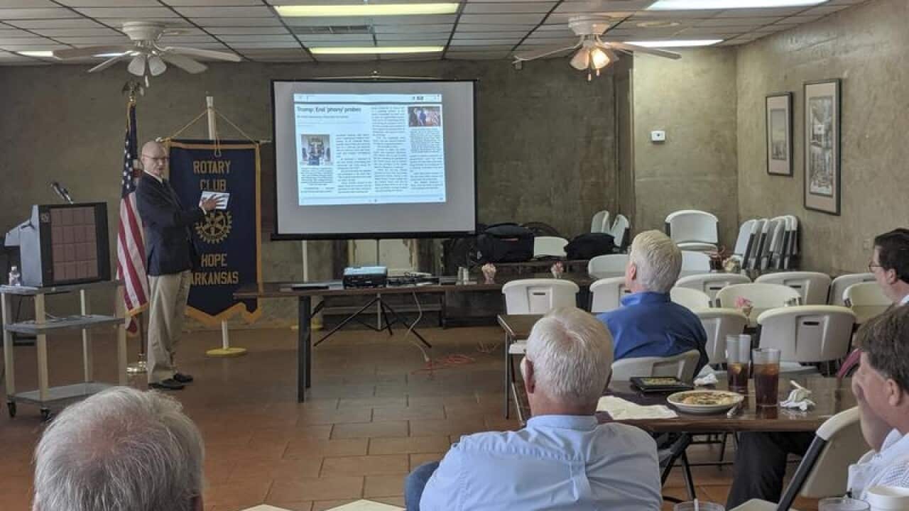 Walter Hussman Jr explains the digital form to the local Rotary Club