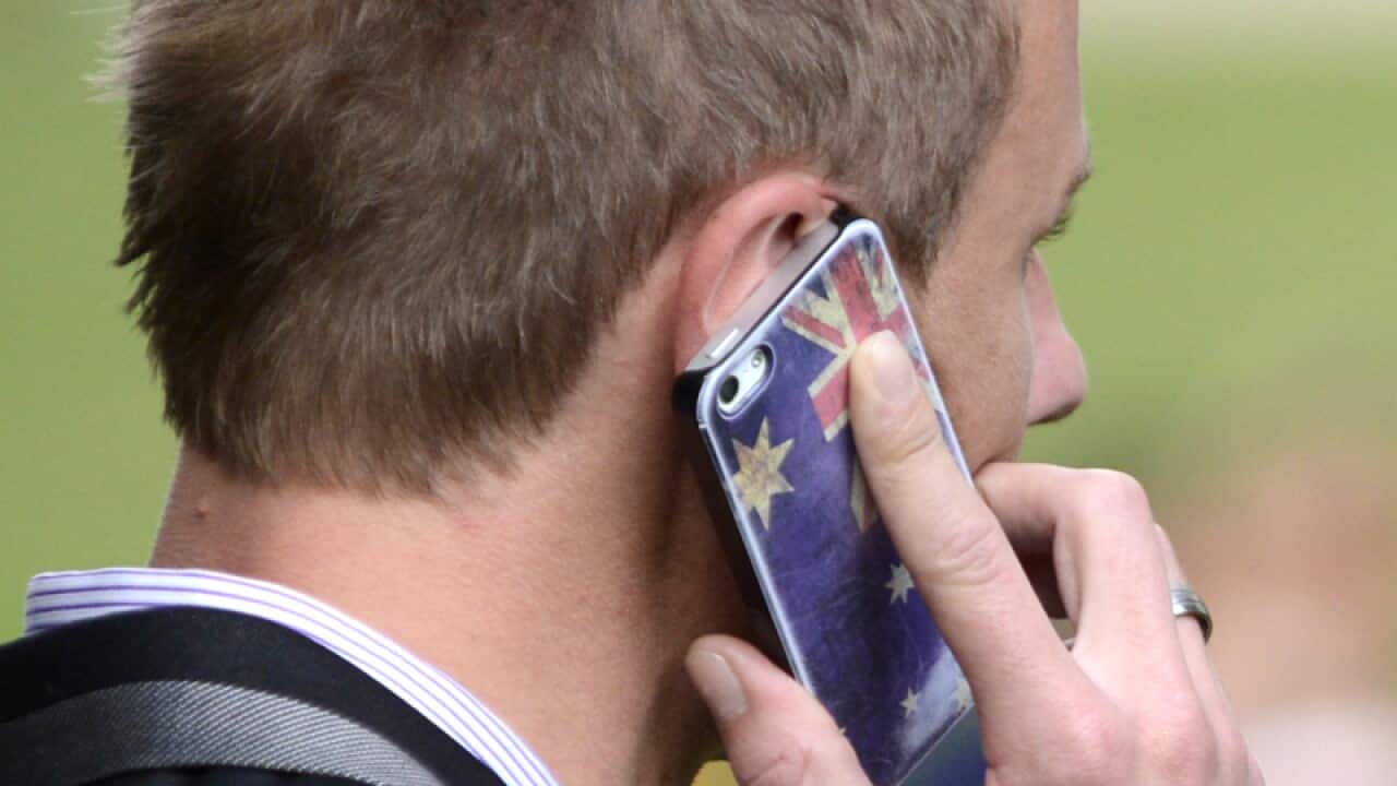 A man talks on his mobile phone in Brisbane