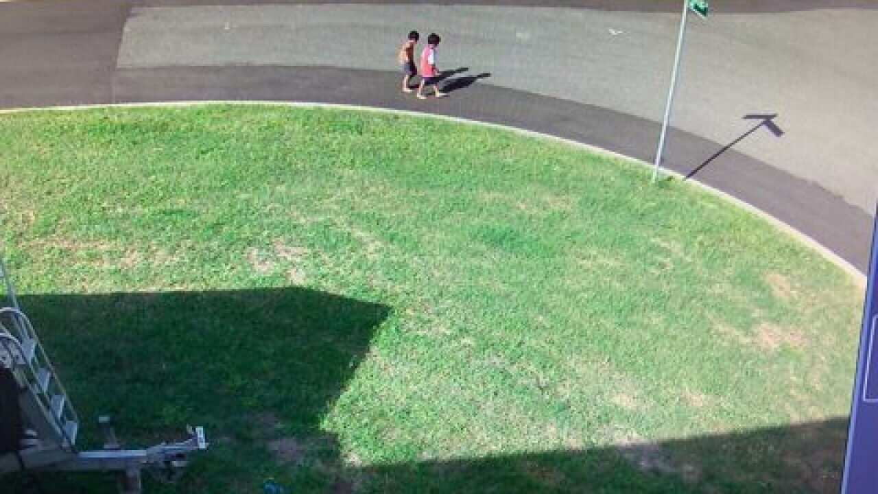 Townsville police have begun a large-scale search for the boys.