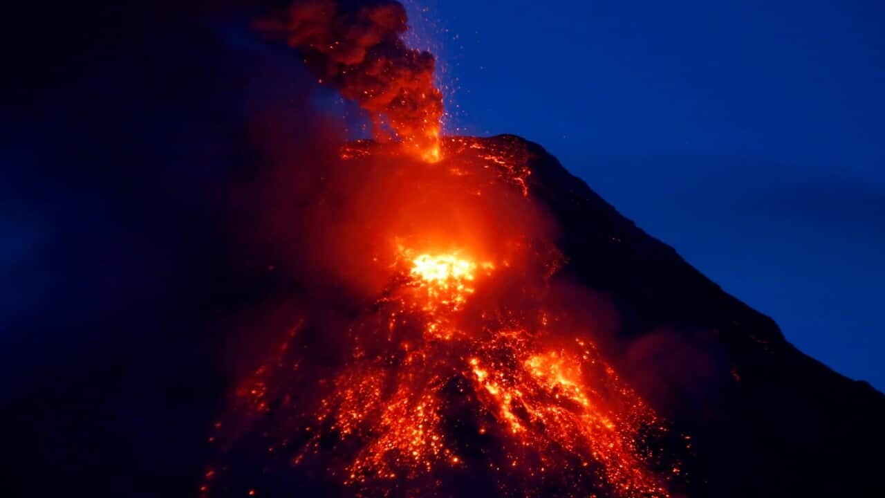 Mayon volcano spews red-hot lava in another eruption as seen from Legazpi city, Albay province, 