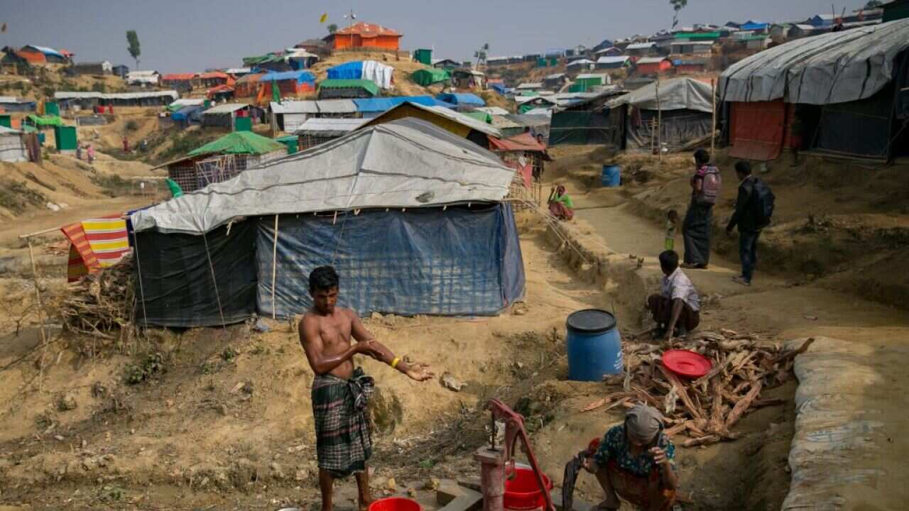 Rohingya refugees are seen at a well in Balukhali camp on January 14, 2018 in Cox's Bazar, Bangladesh.