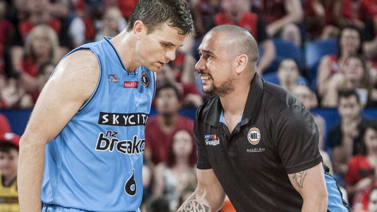 Paul Henare coach for the NZ Breakers talks to Kirk Penney