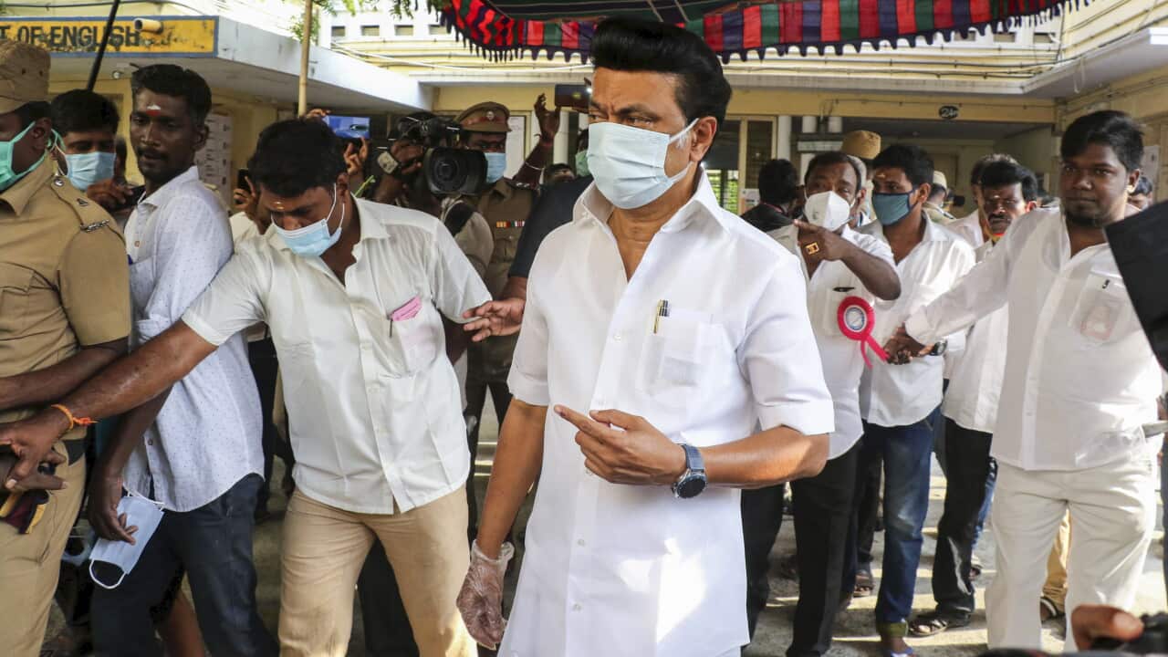 Dravida Munnetra Kazhagam party chief Muthuvel Karunanidhi Stalin displays his ink mark after casting his vote in the Tamil Nadu state assembly elections in Chennai,India, Tuesday,April 6, 2021. (AP Photo/R.Parthibhan)