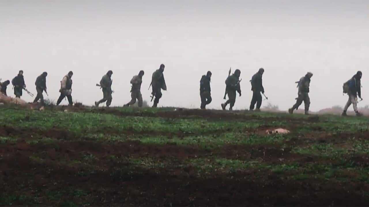 Jabhat al-Nusra fighters are shown in one of the group's videos.