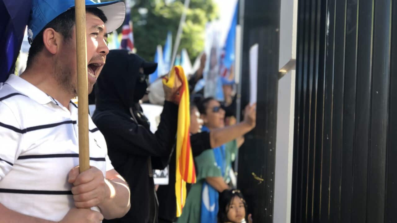 Protestors at the opening of a new Chinese consulate in Adelaide.