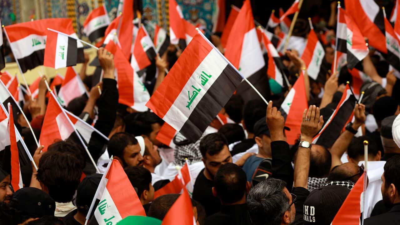Followers of Shiite cleric Moqtada Al Sadr chant slogans against corruption, the US and Israel during demonstrations.
