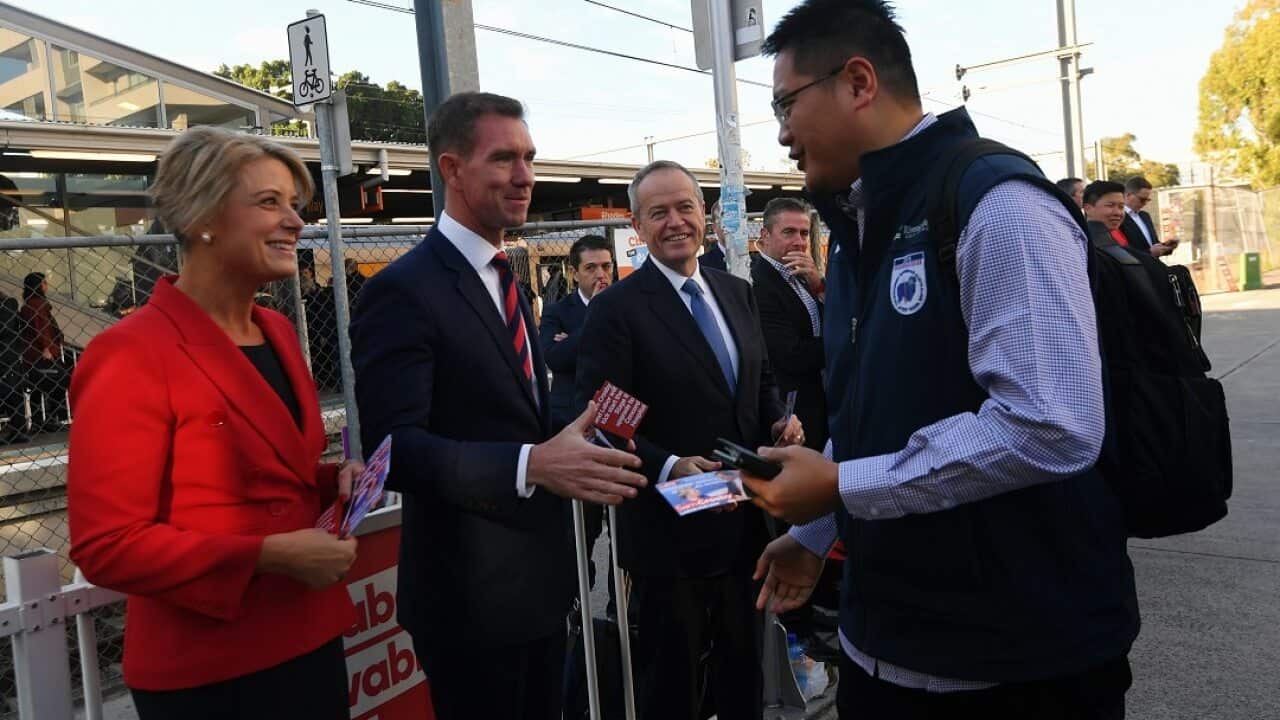 Labor is accusing some Liberal volunteers of making racist slurs at Reid pre-polling booths.