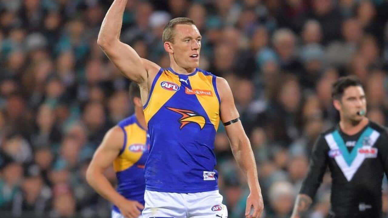 Drew Petrie celebrates one of his two goals