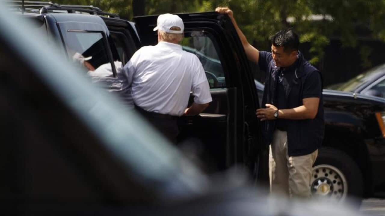 President Trump gets into his vehicle at the White House