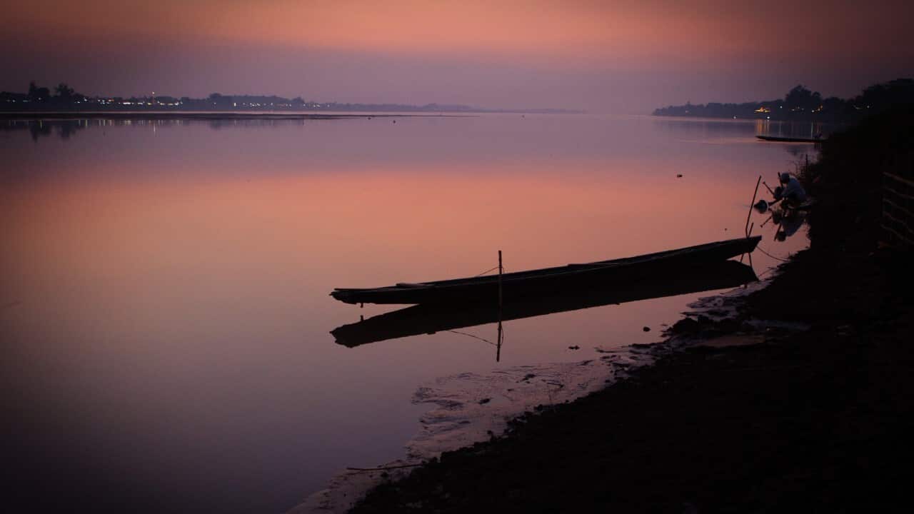 A solitary boat moored on the banks of Mekong river at sunset on the border between Thailand and Laos (Yvan Cohen - LightRocket via Getty Images).jpg