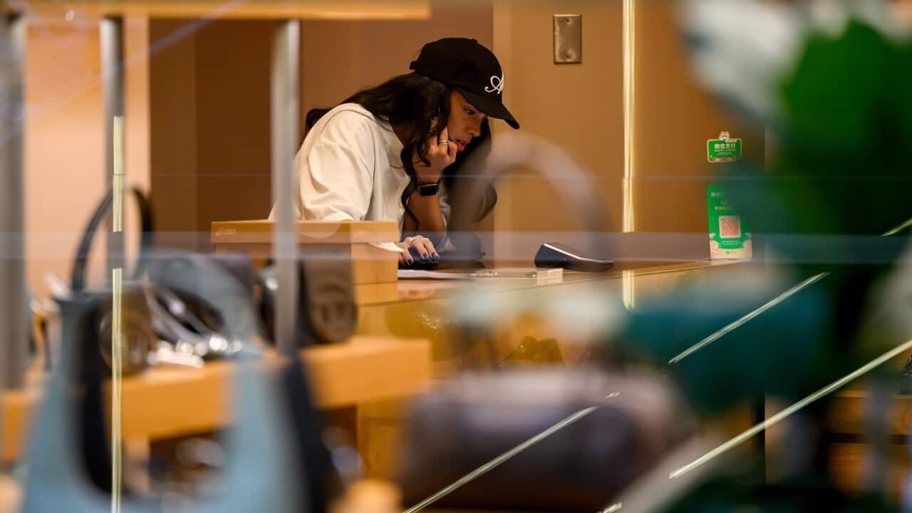 thumbnail_A female retail worker is seen at work in Sydney, New South Wales (AAP Image-Bianca De Marchi).jpg