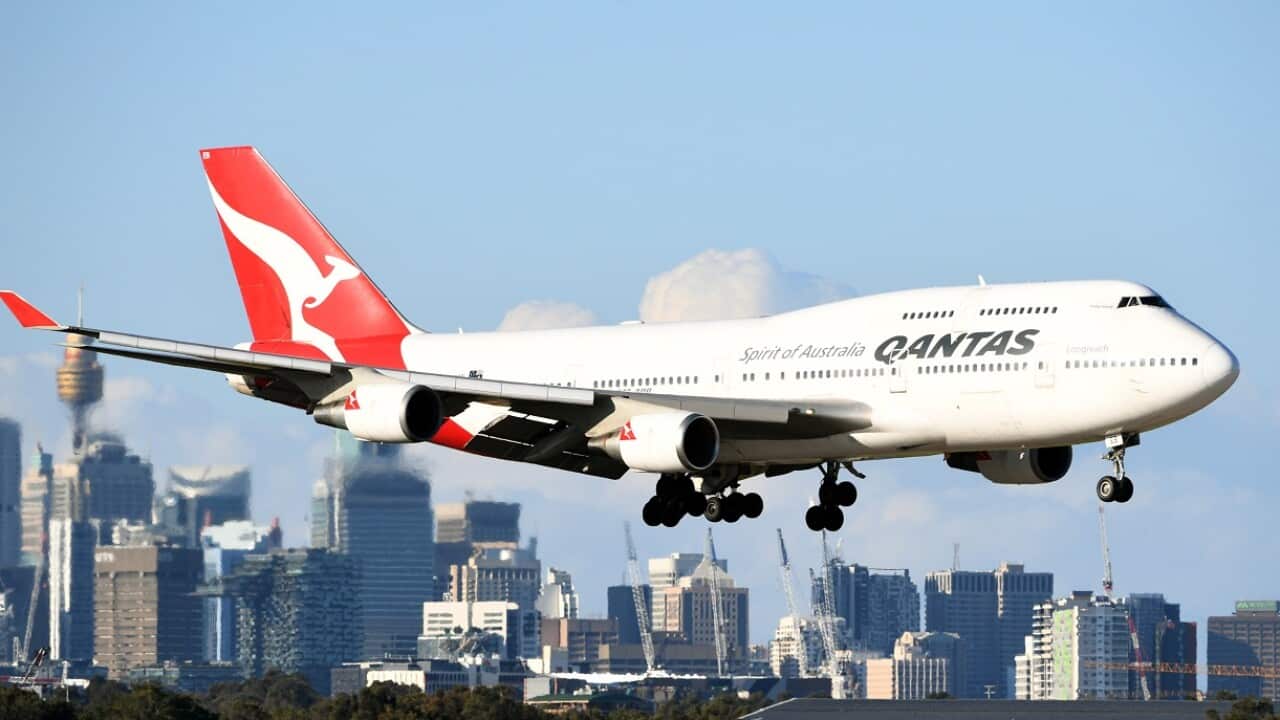 A Qantas plane arrives at Sydney Airport.