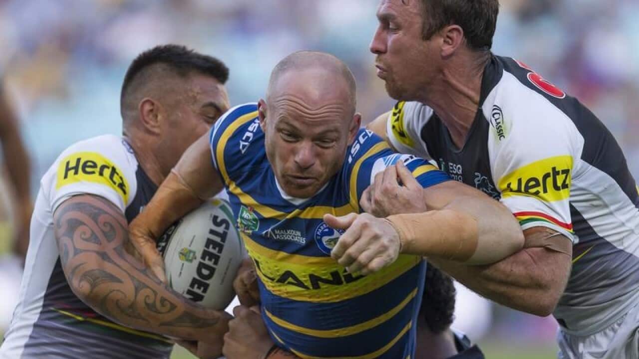 Beau Scott of the Eels is tackled during Round 5.