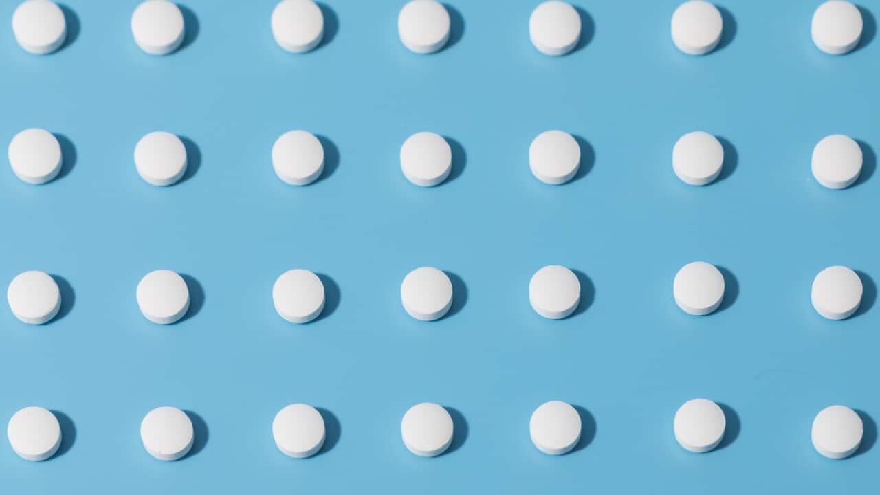 White medicine pills in rows