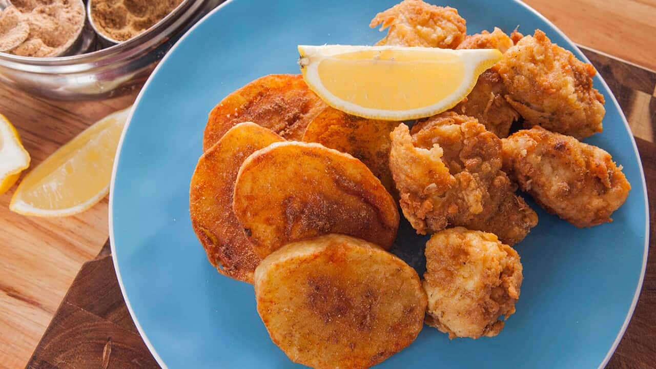 Battered Amritsari fish with smashed fried potatoes