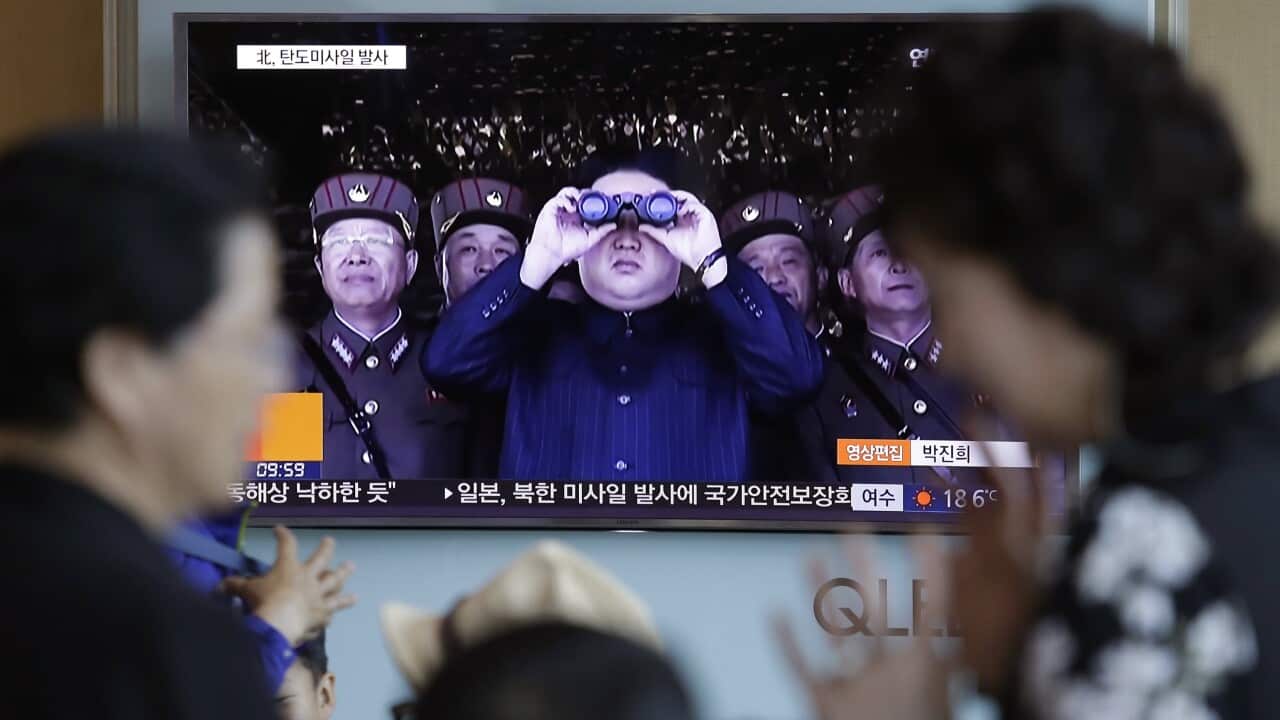 A South Korean TV news program shows a file image of North Korean leader Kim Jong Un.
