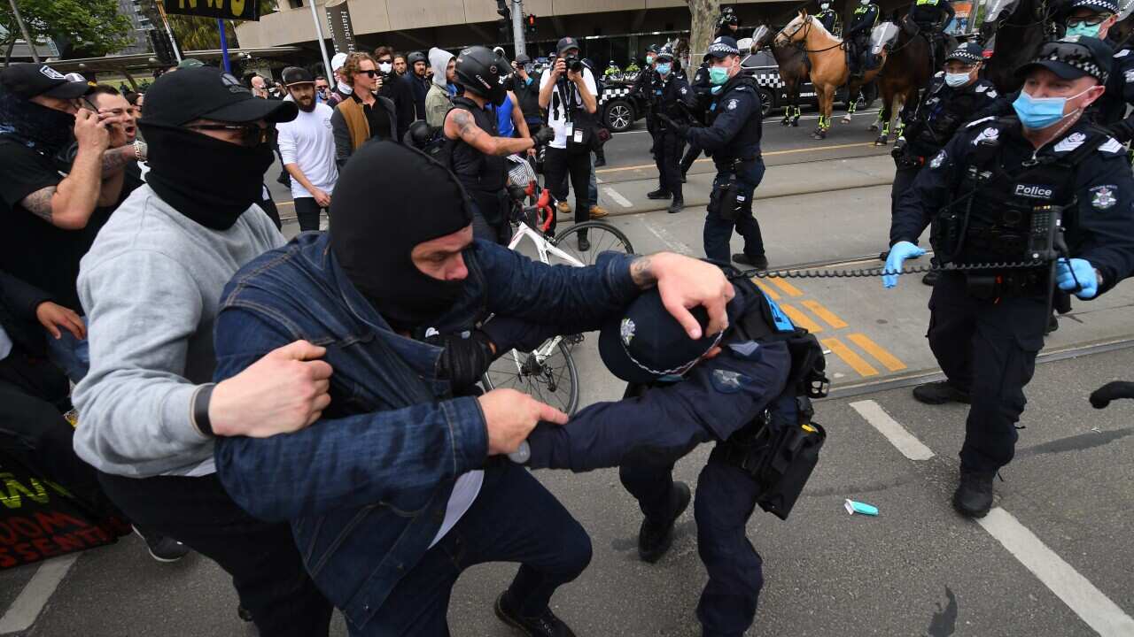 Protesters at an anti-lockdown protest in Melbourne on 23 October.