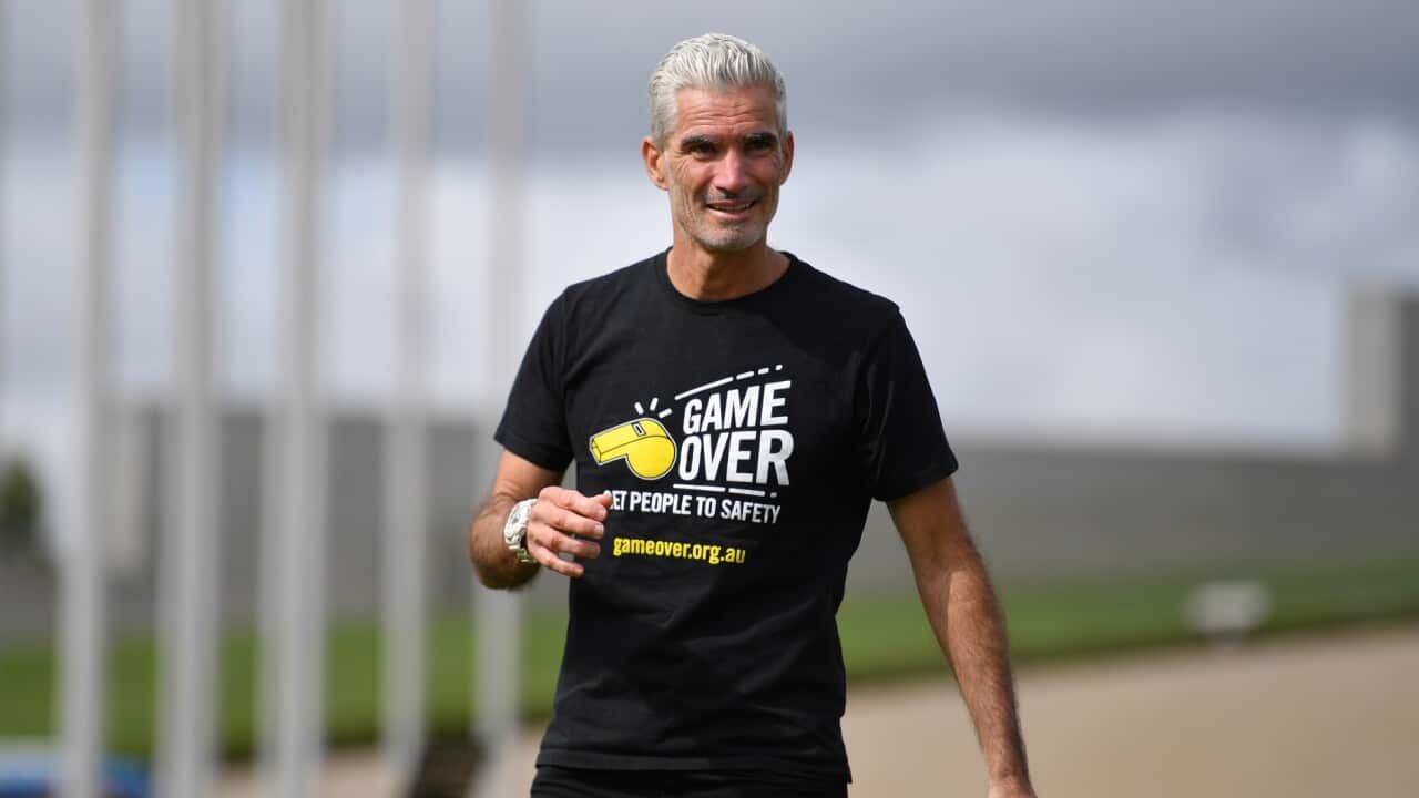 Former Socceroo Craig Foster outside Parliament House in Canberra
