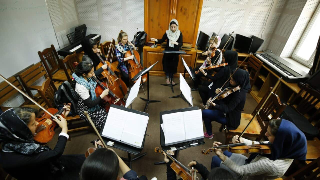 the first female orchestra conductor in Afghanistan at the Afghan National Institute of Music (ANIM) in Kabul, Afghanistan