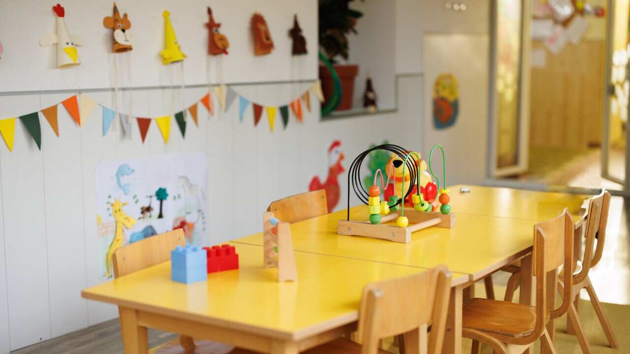 Empty kindergarten classroom interior