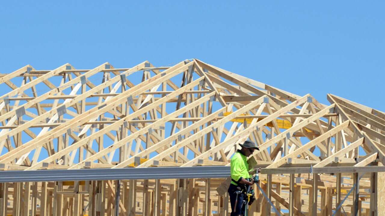 A carpenter on a construction site