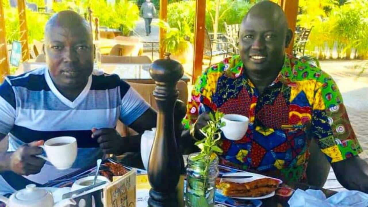 young Tycoon Lawrence Lual Malong Yor and one of his friends