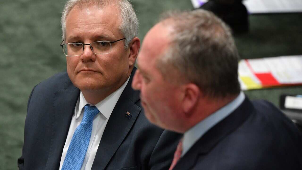 Prime Minister Scott Morrison and Deputy Prime Minister Barnaby Joyce during Question Time in the House of Representatives at Parliament House in Canberra, Tuesday, October 19, 2021. (AAP Image/Mick Tsikas) NO ARCHIVING