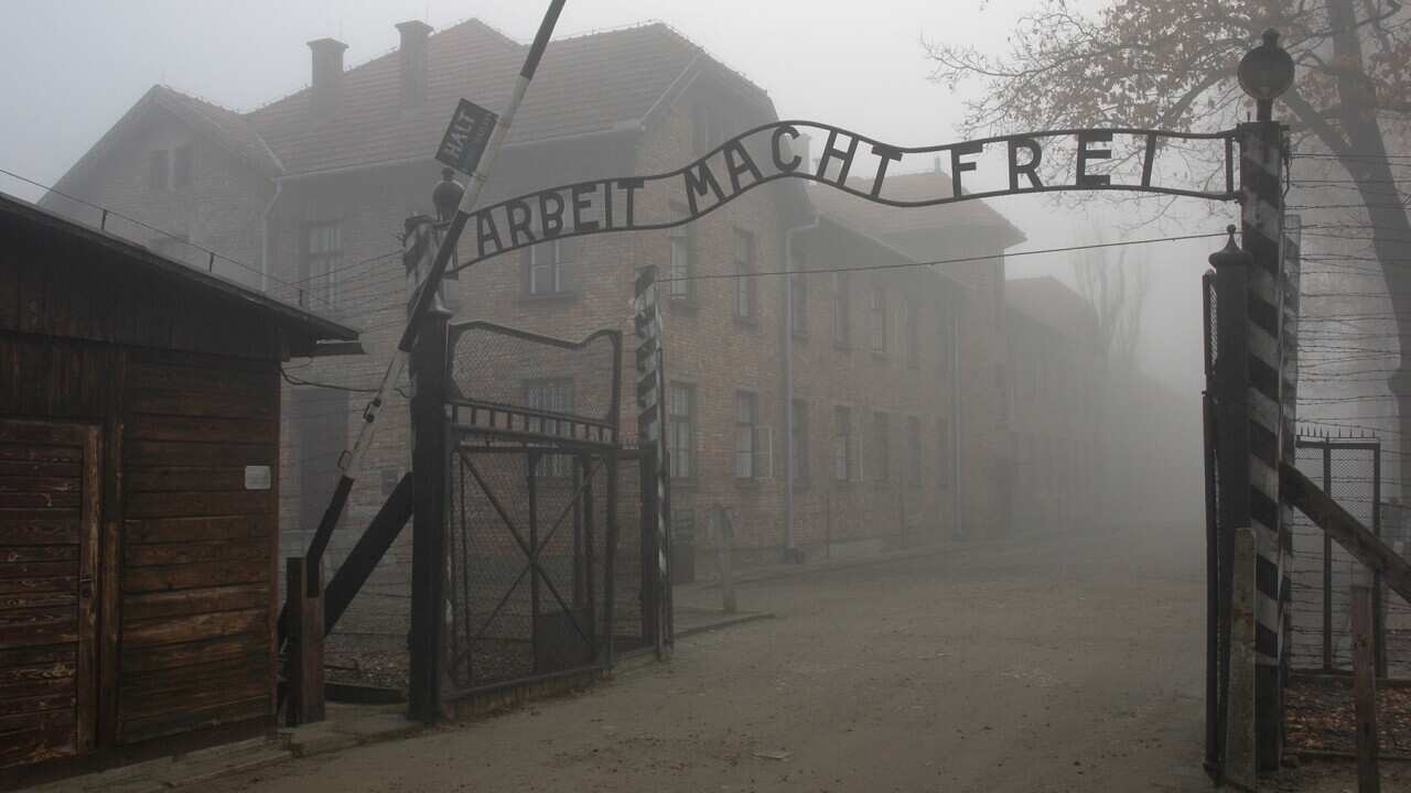 The 'Arbeit macht Frei' gate ('Work sets free) at the former German Nazi concentration and extermination camp Auschwitz