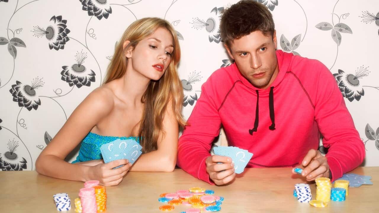 Young Couple Gambling