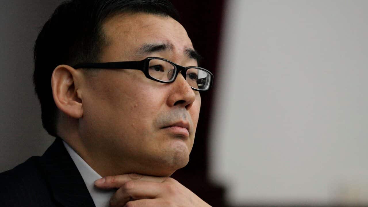 Australian writer Yang Hengjun attends a lecture at Beijing Institute of Technology in Beijing, China.