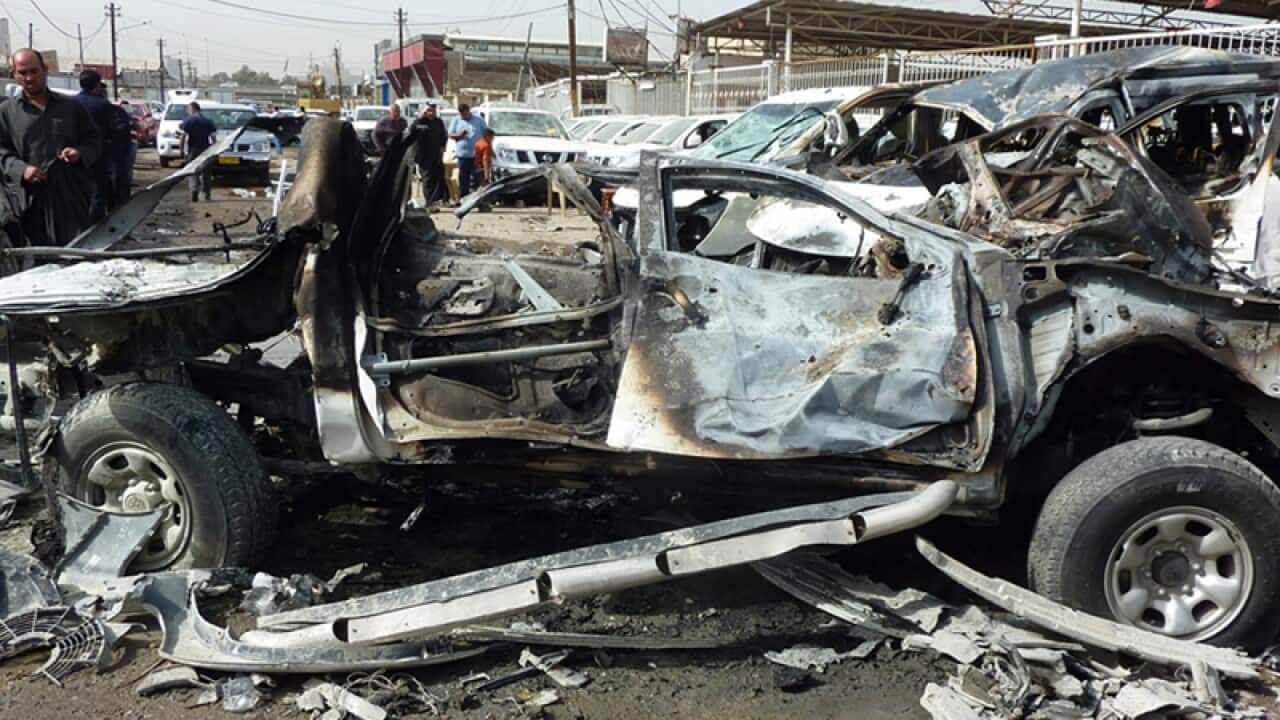 The site of a car bomb attack in Iraq.
