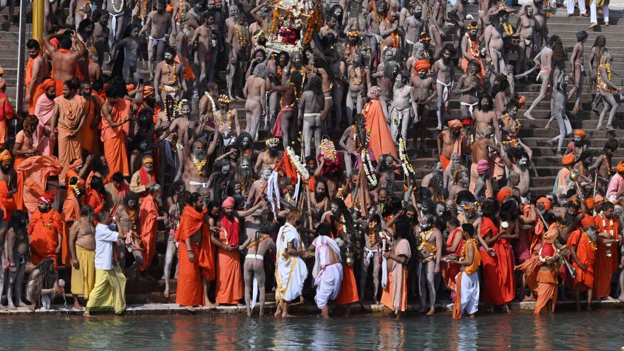 Naga Sadhus (Hindu holy men) gather before taking a dip in the River Ganges on the Maha Shivratri festival in Haridwar on 11 March 2021.