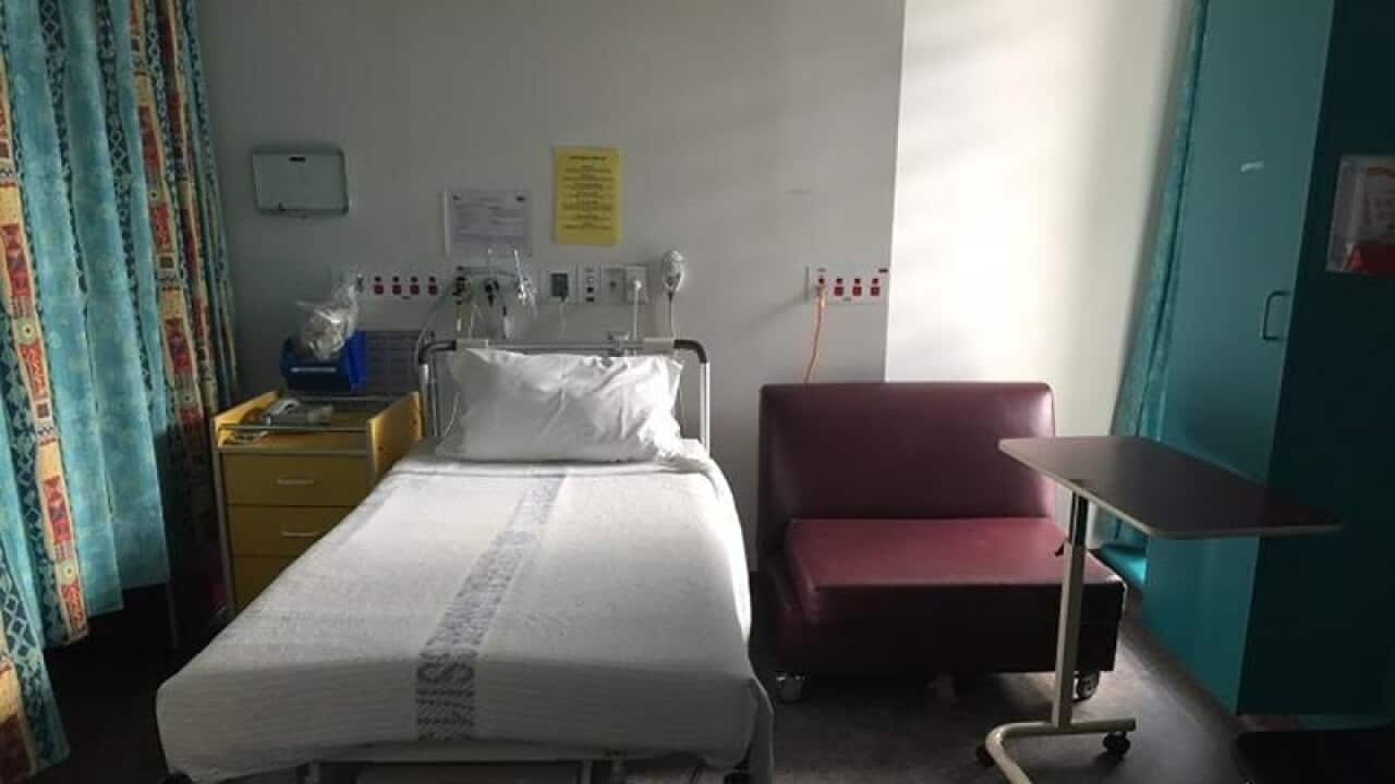 An empty bed seen in a recovery room.