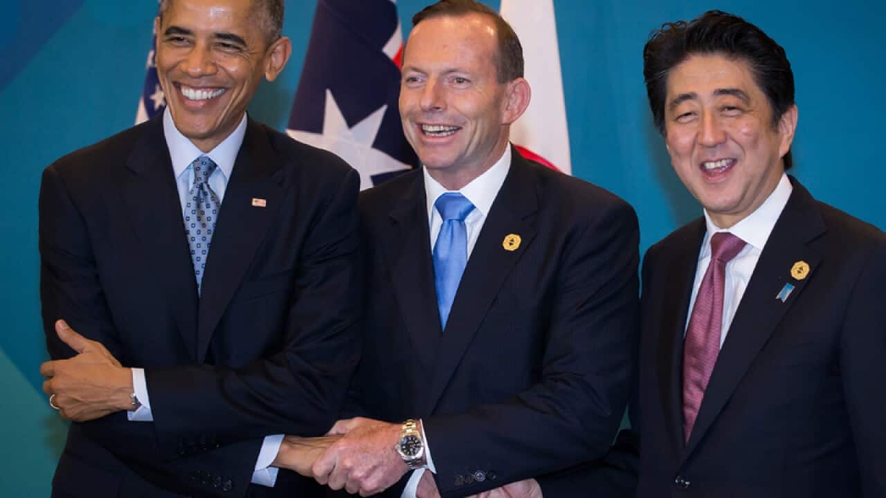 Barack Obama (left) Tony Abbott (centre) and Shinzo Abe