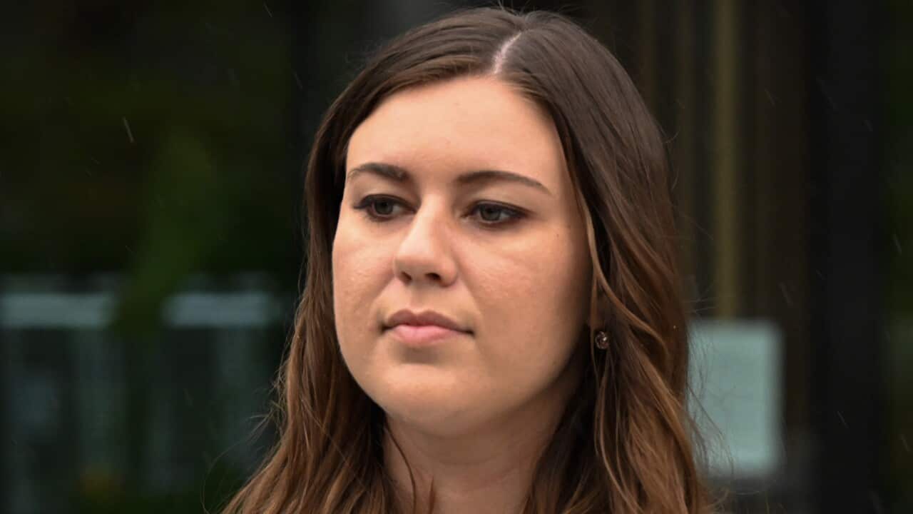 A woman standing outside.