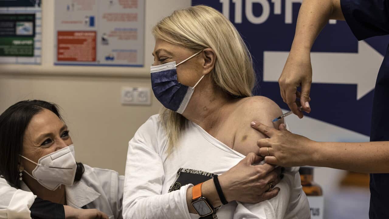 Rinat Orion receives the fourth dose of Pfizer-BioNTech COVID-19 vaccine, at Sheba Medical Centre in Ramat Gan, Israel.