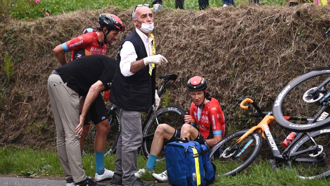 Marco Haller of Team Bahrain Victorious looks on after Jack Haig suffered an injury at the Tour de France