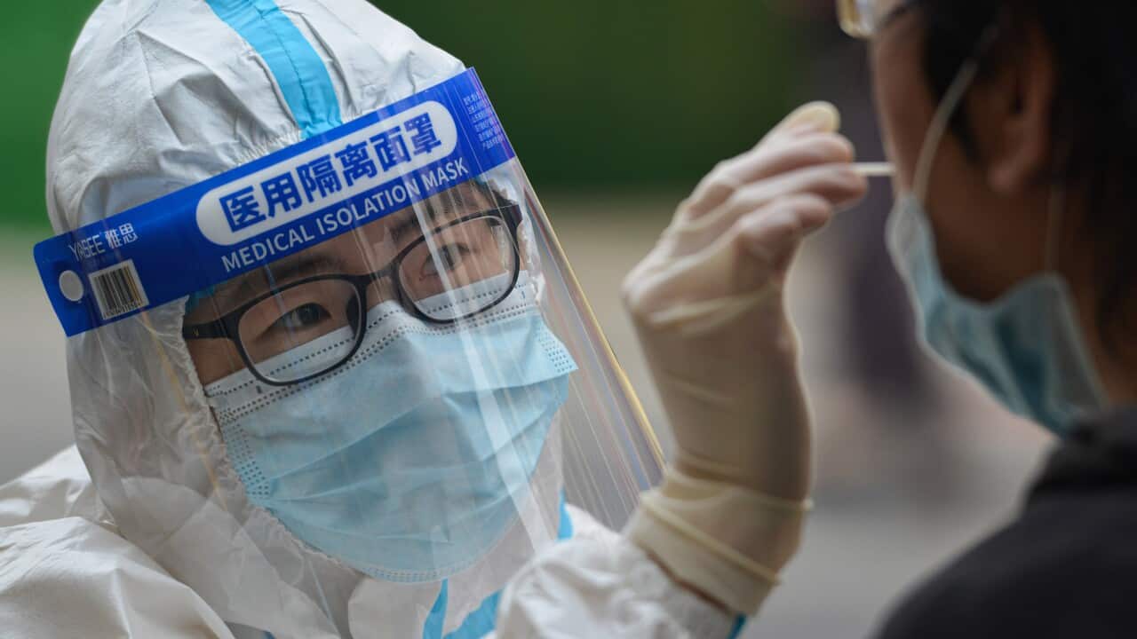 Residents receive nucleic acid tests for COVID-19 in Fuyang, China - 12 Apr 2022