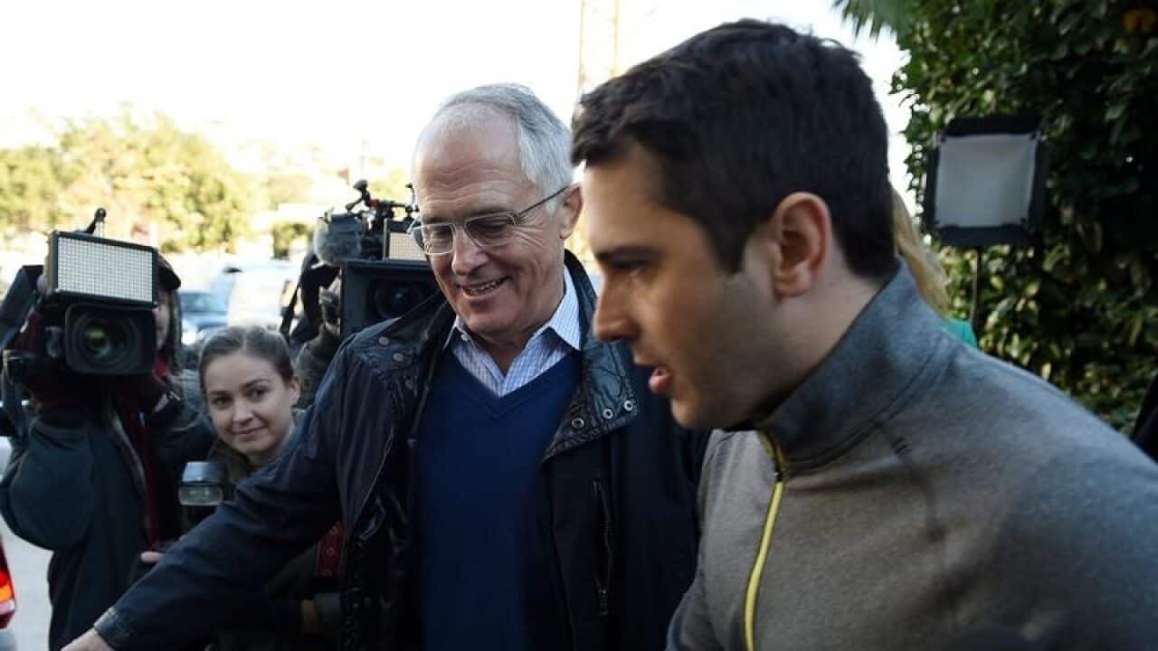 Malcolm Turnbull and his son Alex leave his home in Sydney.