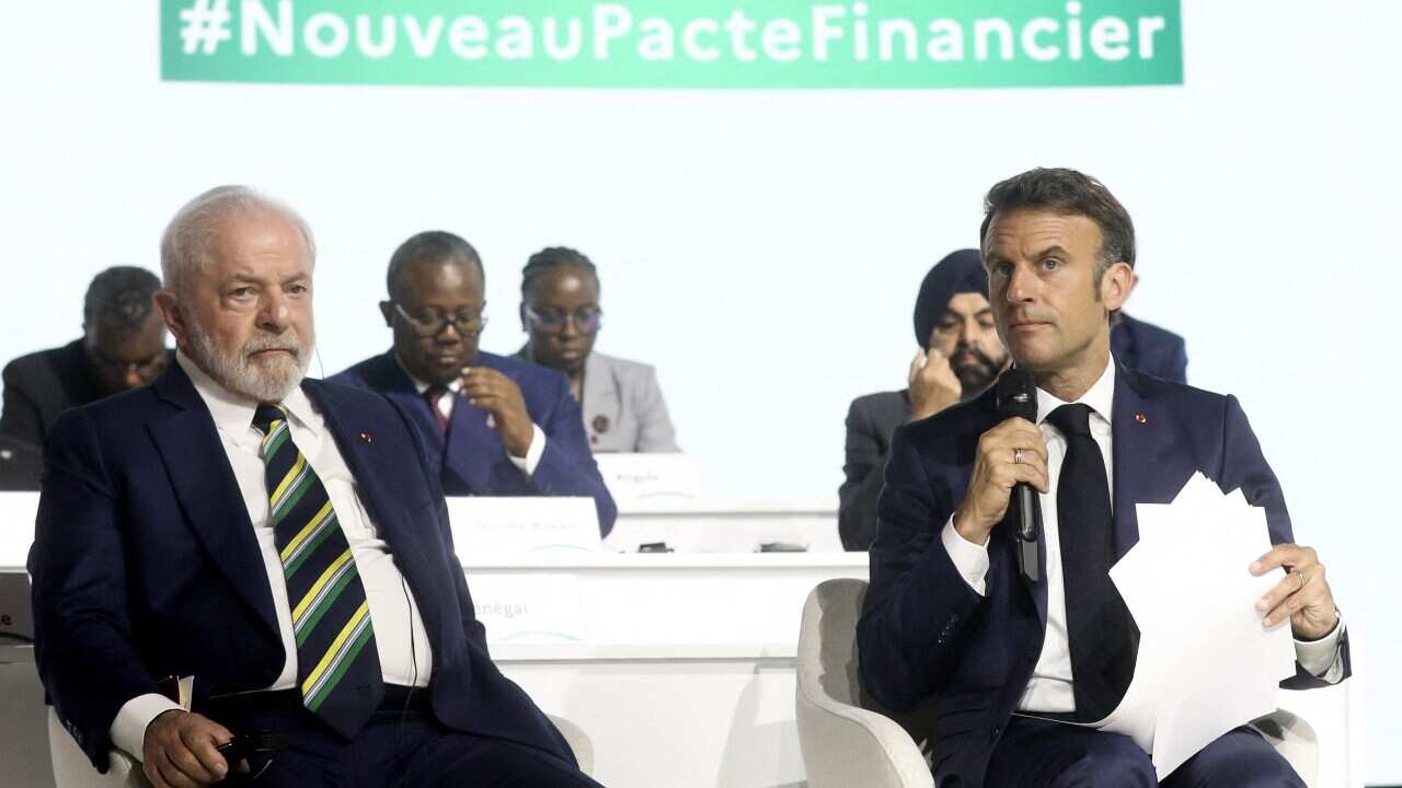 French President Emmanuel Macron and Brazilian President Lula Da Silva during the closing session of the New Global Financial Pact Summit in Paris
