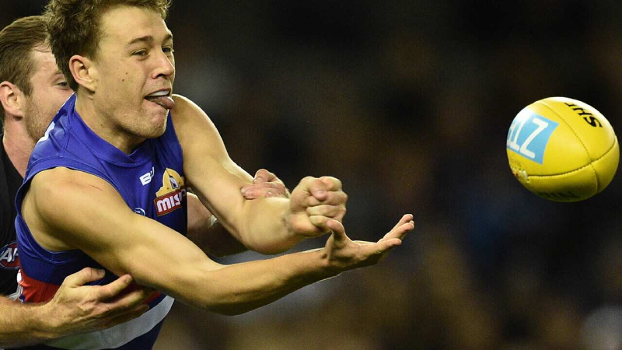 Jack Macrae (right) of the Bulldogs