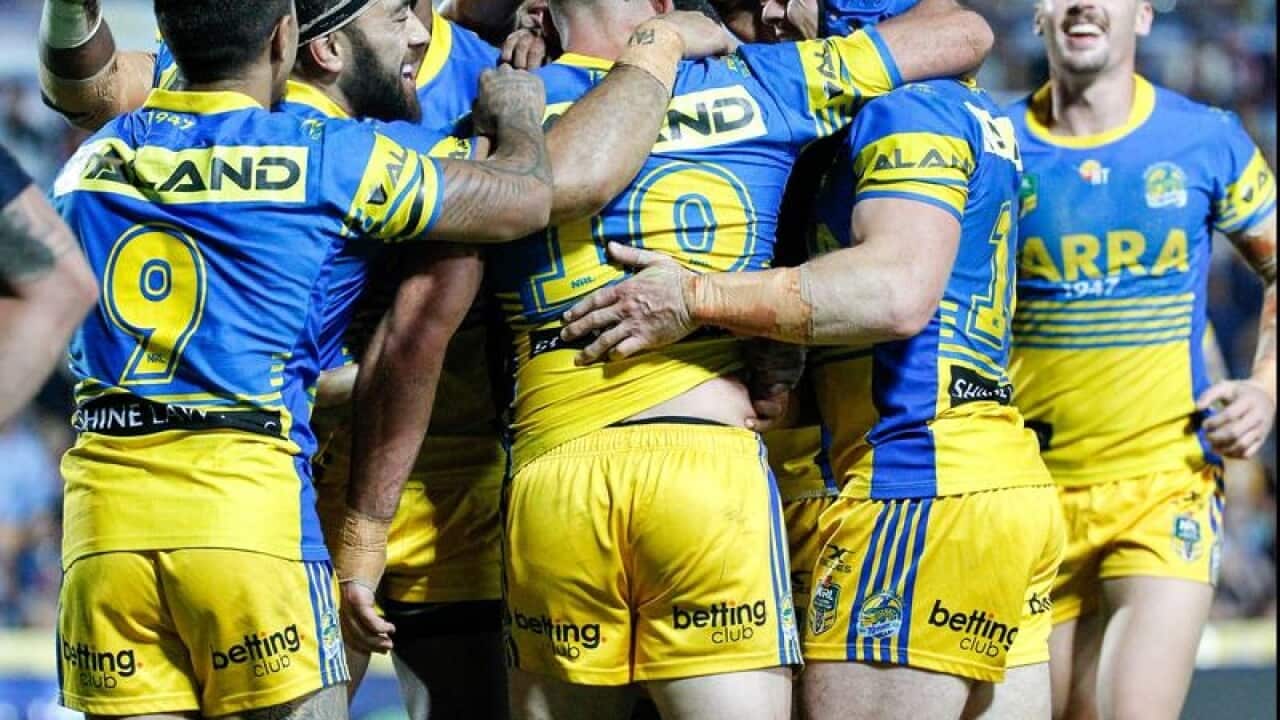 The Eels celebrate a Tom Mannah try